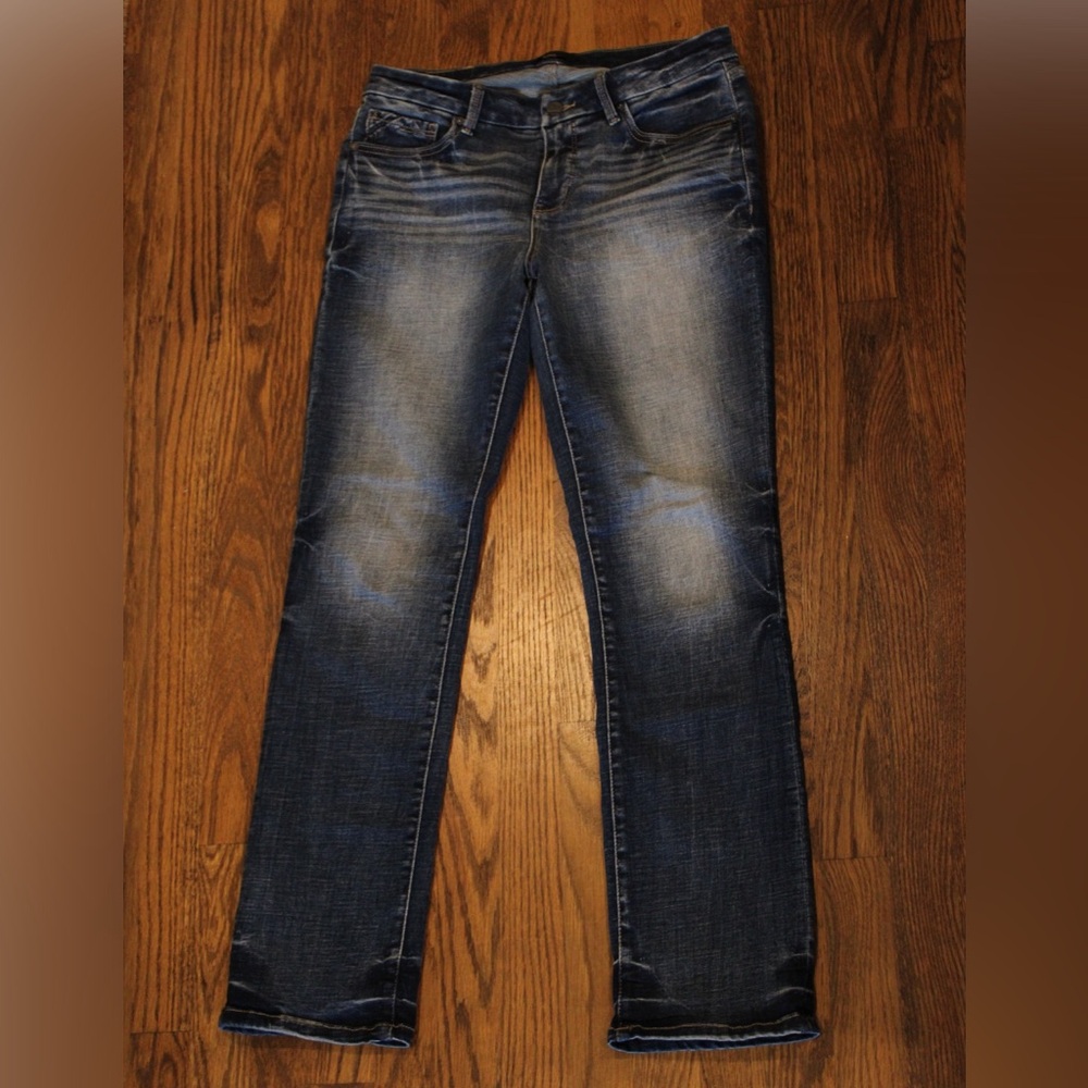Women’s dark washed Buckle Black jeans